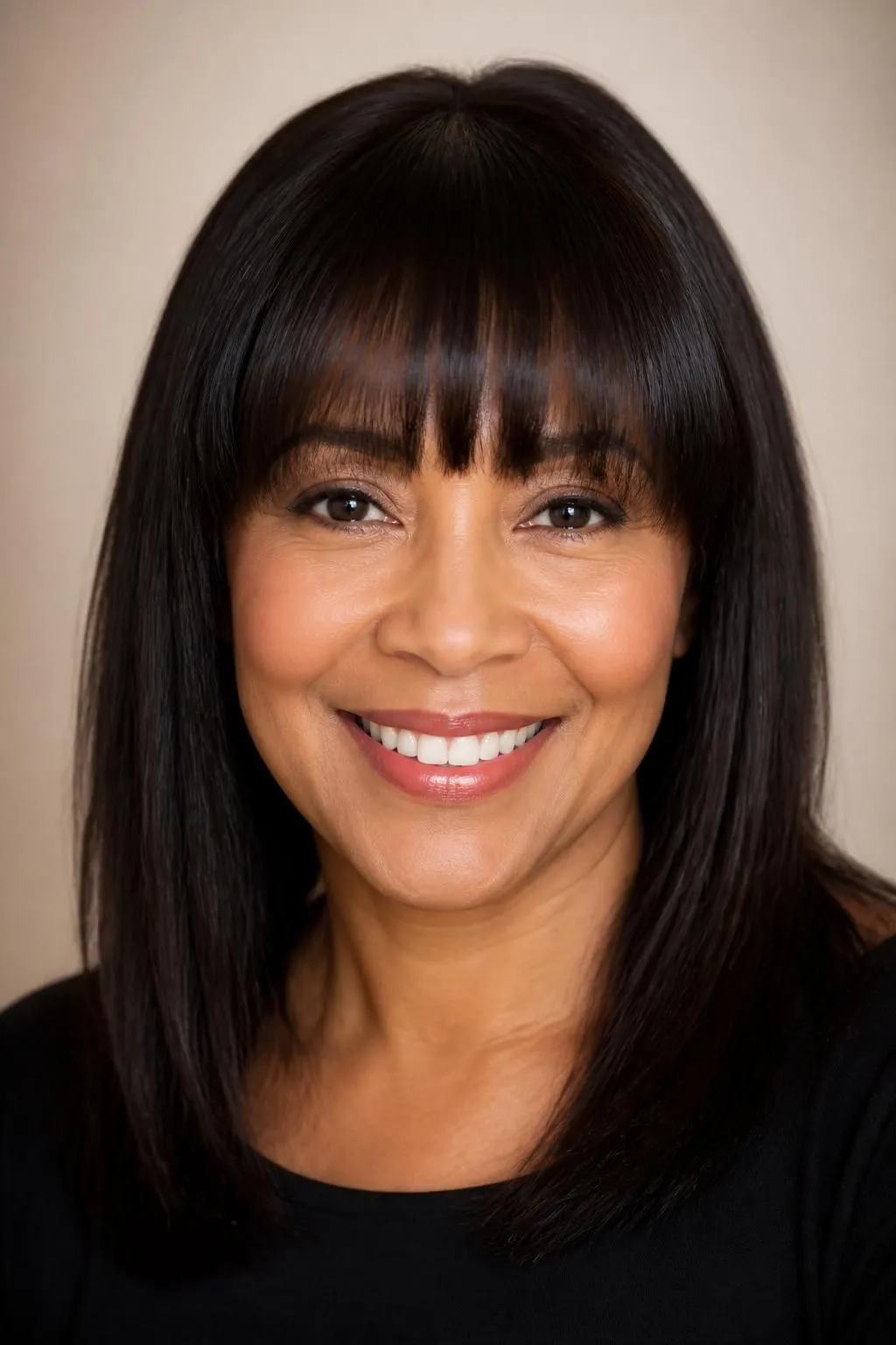 26 Modern Bangs Hairstyles for Women Over 40: Flattering Cuts for Every Face Shape 23 26 Modern Bangs Hairstyles for Women Over 40: Flattering Cuts for Every Face Shape